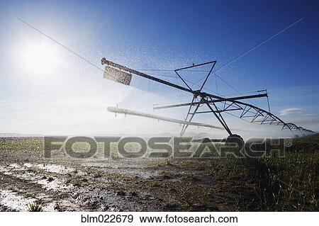 Irrigation Sprinkler in Field View Large Photo Image Stock Photo - Irrigation Sprinkler in Field. Fotosearch
