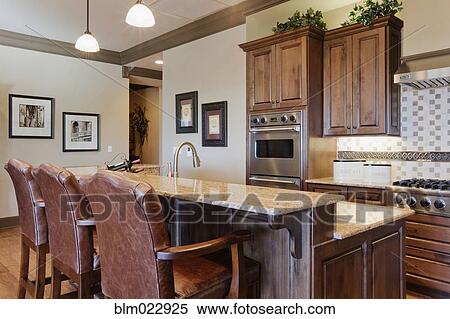 Stock Photography - Kitchen Space With Eating Bar. Fotosearch