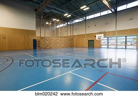 Large empty gym at a public recreation community center View Large Photo Image Stock Image - Large empty gym at a public recreation community center. Fotosearch