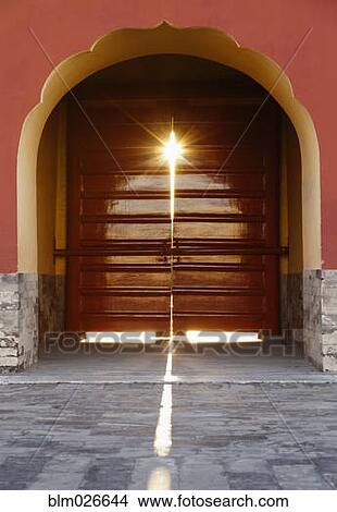 Light streams through a door at the Temple of Heaven in Beijing View Large Photo Image Picture - Light streams through a door at the Temple of Heaven in Beijing. Fotosearch