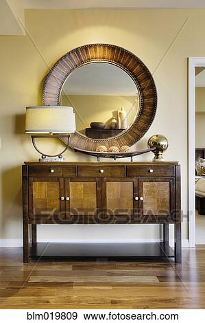 Living Room Cabinet With Mirror Stock Photo Blm019809 Fotosearch