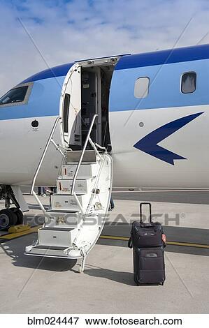 Luggage Near Airplane Steps View Large Photo Image Stock Photo - Luggage Near Airplane Steps. Fotosearch