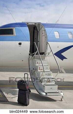 Luggage Near Airplane Steps View Large Photo Image Stock Photo - Luggage Near Airplane Steps. Fotosearch