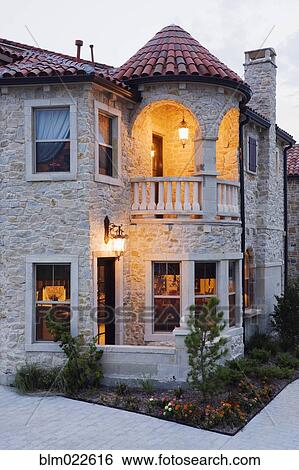 Stock Photograph - Luxury Home at Dusk. Fotosearch