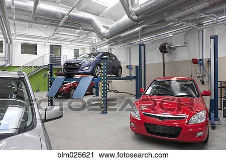 Stock Image - Mechanical and practical education facility car workshop. Fotosearch