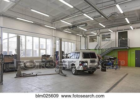 Stock Photo - Mechanical and practical education facility car workshop. Fotosearch