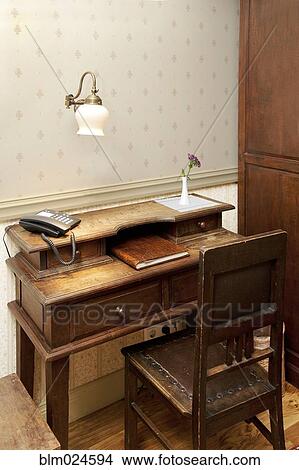 Modern Phone On An Old Fashioned Desk Picture Blm024594 Fotosearch