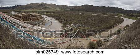 Mountain landscape, view from hillside over the world's largest mani wall View Large Photo Image Stock Photo - Mountain landscape, view from hillside over the world's largest mani wall. Fotosearch