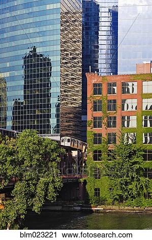 Stock Image - Office Buildings Along the Chicago River. Fotosearch