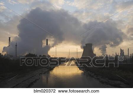 Oil refinery at sunset View Large Photo Image Stock Image - Oil refinery at sunset. Fotosearch