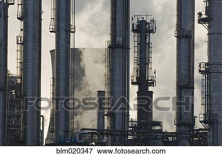 Oil refinery buildings View Large Photo Image Stock Photo - Oil refinery buildings. Fotosearch
