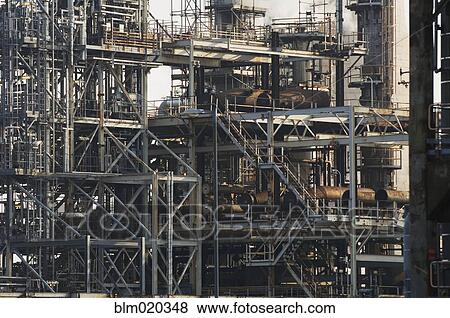 Oil refinery buildings View Large Photo Image Stock Photo - Oil refinery buildings. Fotosearch