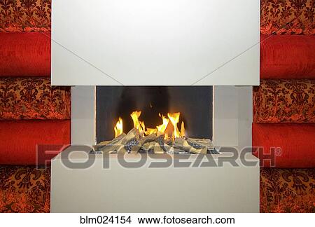 Open gas fire, in a smooth stone fireplace View Large Photo Image Picture - Open gas fire, in a smooth stone fireplace. Fotosearch