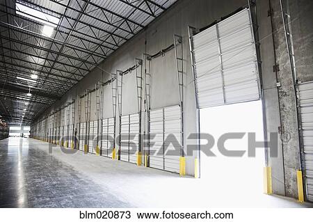 Stock Image - Open Warehouse Bay Door. Fotosearch