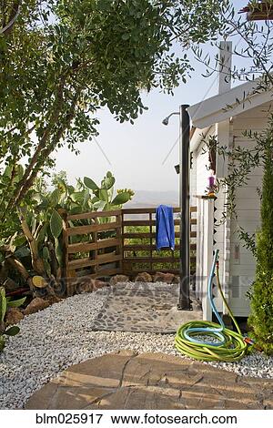Outdoor shower on the small terrace on a summer retreat View Large Photo Image Stock Photo - Outdoor shower on the small terrace on a summer retreat. Fotosearch