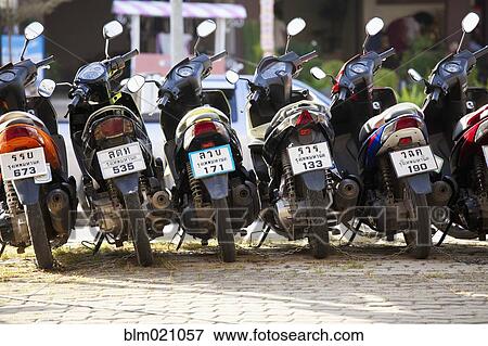 Parked Motor Scooters View Large Photo Image Stock Photo - Parked Motor Scooters. Fotosearch