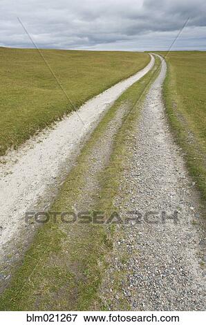 Stock Photo - Path Across a Countryside Grassland. Fotosearch