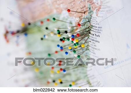 Stock Image - Pins in Map of US and Canadian Border. Fotosearch