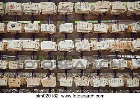 Prayer tablets written by visitors to the Meiji Jingu Shrine, Tokyo, Japan View Large Photo Image Stock Image - Prayer tablets written by visitors to the Meiji Jingu Shrine, Tokyo, Japan. Fotosearch