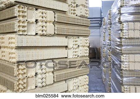 Processing plant of cardboard cartons for packaging eggs View Large Photo Image Picture - Processing plant of cardboard cartons for packaging eggs. Fotosearch