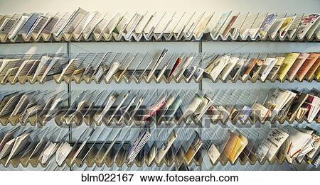 Racks of Brochures on Shelves View Large Photo Image Stock Photo - Racks of Brochures on Shelves. Fotosearch