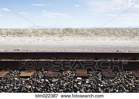 Stock Photo - Railroad Tracks Through the Salt Flats. Fotosearch