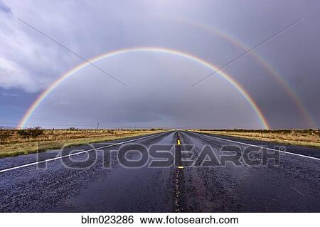 Rainbow on a Rural Road View Large Photo Image Stock Photograph - Rainbow on a Rural Road. Fotosearch