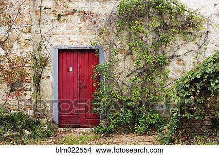 Red Door in Old Brick and Stone Cottage View Large Photo Image Picture - Red Door in Old Brick and Stone Cottage. Fotosearch