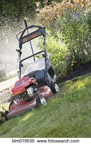 Stock Photography - Red Lawnmower. Fotosearch