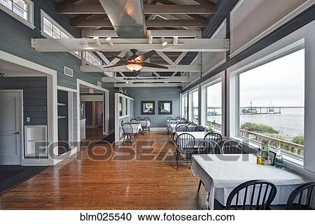 Stock Image - Restaurant Dining Room interior. Fotosearch