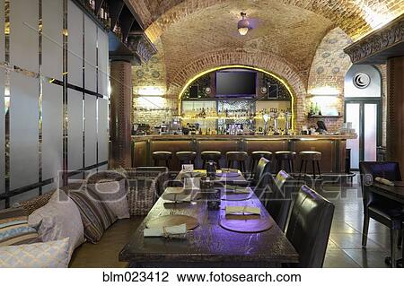 Restaurant interior with bar on background View Large Photo Image Stock Image - Restaurant interior with bar on background. Fotosearch