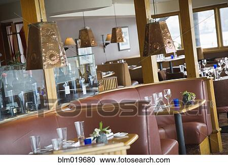Stock Image - Rounded Restaurant Booths. Fotosearch