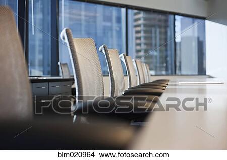 Row of Chairs and a Table in a Conference Room View Large Photo Image Picture - Row of Chairs and a Table in a Conference Room. Fotosearch