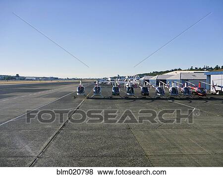 Row of Helicopters View Large Photo Image Stock Photo - Row of Helicopters. Fotosearch