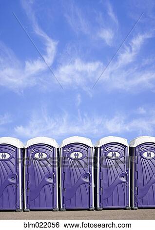 Row of Portable Plastic Toilets View Large Photo Image Stock Photograph - Row of Portable Plastic Toilets. Fotosearch