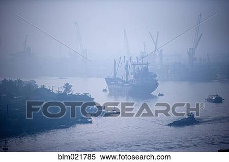Ship on Song Sai Gon River, Vietnam View Large Photo Image Stock Photography - Ship on Song Sai Gon River, Vietnam. Fotosearch