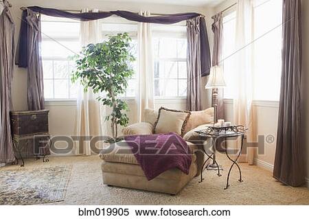 Stock Photography - Sitting area in a master bedroom. Fotosearch