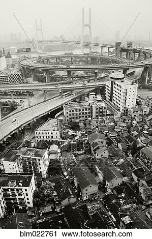 Slum Housing with Nanpu Bridge in Background View Large Photo Image Stock Image - Slum Housing with Nanpu Bridge in Background. Fotosearch