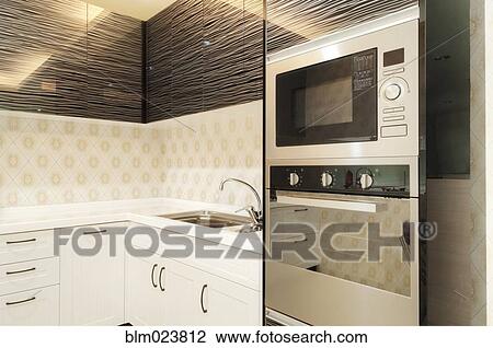 Small modern kitchen decorated by black glass View Large Photo Image Stock Image - Small modern kitchen decorated by black glass. Fotosearch