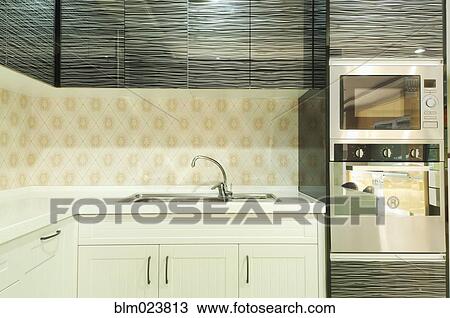 Small modern kitchen decorated by black glass View Large Photo Image Stock Image - Small modern kitchen decorated by black glass. Fotosearch