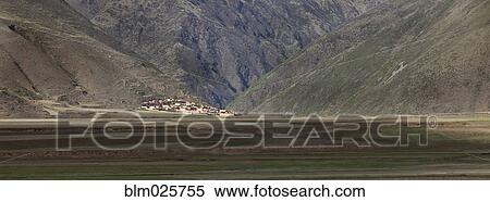 Stock Photography - Small village in a mountain valley. Fotosearch