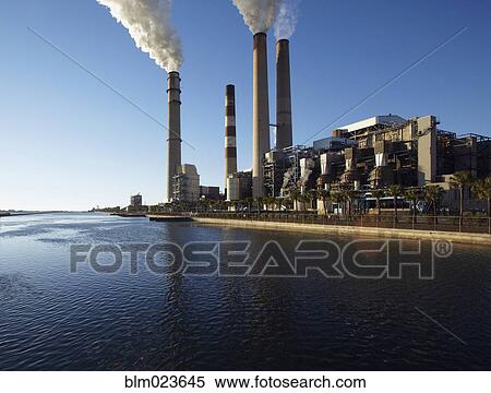 Stock Photography - Smoke Rising From Smokestacks. Fotosearch