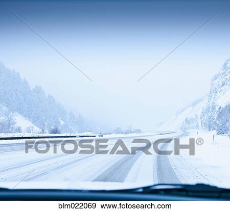 Stock Photo - Snow-Covered Road. Fotosearch