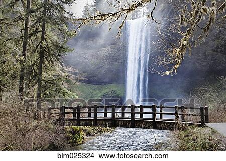 Picture - South Falls, cloaked by mist and splashing water . Fotosearch
