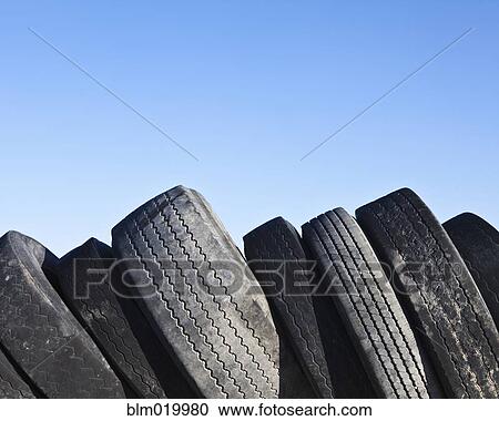 Stack of discarded rubber tires View Large Photo Image Stock Image - Stack of discarded rubber tires. Fotosearch