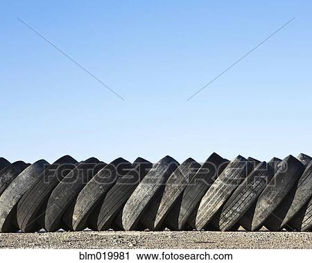 Stack of discarded rubber tires View Large Photo Image Stock Image - Stack of discarded rubber tires. Fotosearch