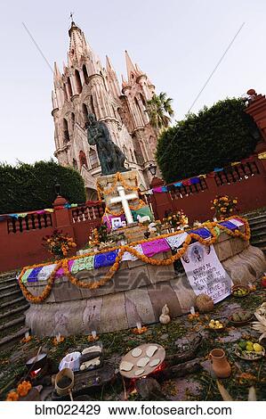 Stock Photo - Statue of Fray San Miguel and Church.. Fotosearch