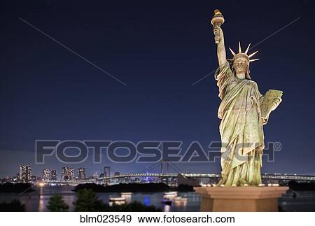 Stock Photo - Statue of Liberty with Tokyo Bay. Fotosearch