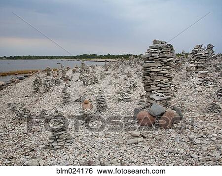 Stock Photograph - Stone Towers on the Beach. Fotosearch