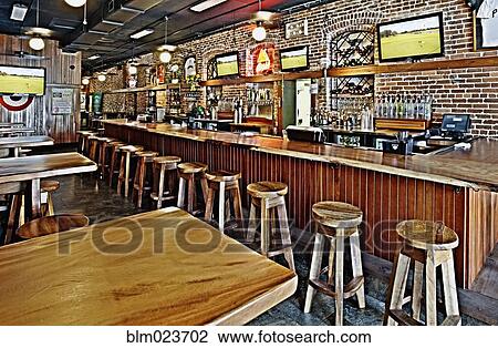 Stools and Counter in a Sports Bar View Large Photo Image Stock Image - Stools and Counter in a Sports Bar. Fotosearch